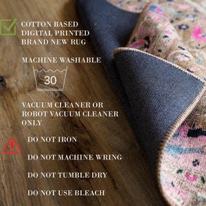May include: A rolled-up, cotton-based, digitally printed rug with a brown, pink, and blue pattern. The rug is machine washable at 30 degrees and should only be cleaned with a vacuum cleaner or robot vacuum. The image also includes care instructions.