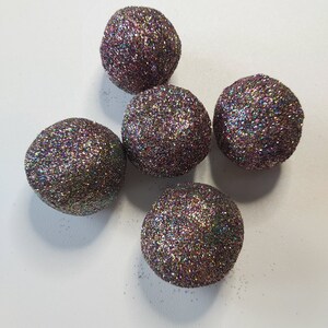 Glitter Clay cracking balls.