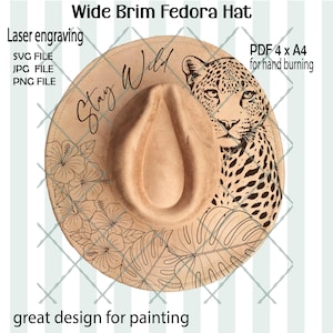 May include: A wide-brimmed fedora hat with laser engraving. The hat features a leopard design, tropical leaves, and the text "Stay Wild." The design is suitable for hand burning and painting.