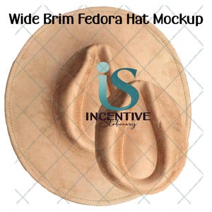 May include: A tan wide brim fedora hat mockup. The hat has a soft, suede-like texture and a classic teardrop crown. The brim is wide and slightly curved. The text "Wide Brim Fedora Hat Mockup" is at the top. The logo for "Incentive Stationery" is in the center.