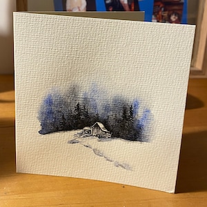 Quadratische cremefarbene Karte zum Öffnen (12,1 x 12,1 cm) mit weißem Umschlag. Handgezeichnete Aquarellillustration.