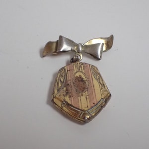 einzigartige vintage Gold Ton 6 seitige Doppelbild Medaillon Fliege