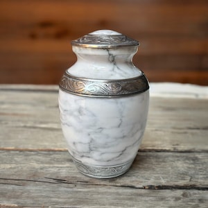 White Marble Cremation Urn with Silver Engraving: Hand-Engraved Memorial