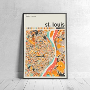 May include: A colorful map of St. Louis, Missouri, with a black frame. The map is in a retro style with a beige background and a river running through the city.