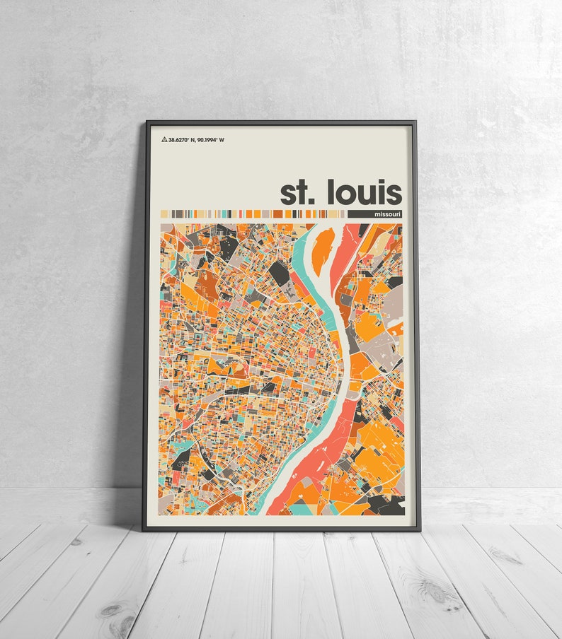May include: A colorful map of St. Louis, Missouri, with a black frame. The map is in a retro style with a beige background and a river running through the city.