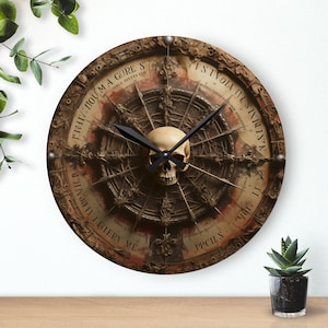 May include: A round wall clock with a skull in the centre and a spiderweb design. The clock face has Roman numerals and the words "PPCHLS", "ME LEIHERN", "LIVOR VIL", "ISTVOLUNT", "MSTDBINS", "T.I.I.D", "A GURE S", "F.H.V.HOU.MA", and "ANELO CARTO CEM".