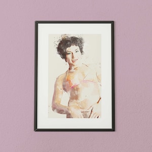 May include: A framed watercolor painting of a woman in a pink bikini, with a soft pink background.