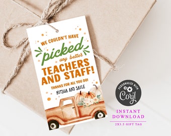 May include: A white gift tag with a fall-themed design. It features a cartoon truck with pumpkins and flowers in the bed. The text reads "We couldn't have picked any better teachers and staff! Thanks for all you do! Nitsua and Saila". The tag is 2x3.5 inches.