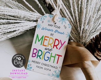 May include: A white gift tag with blue snowflakes and the text "May your Winter Break be Merry and Bright Merry Christmas! From: Sofia" printed in rainbow colors.