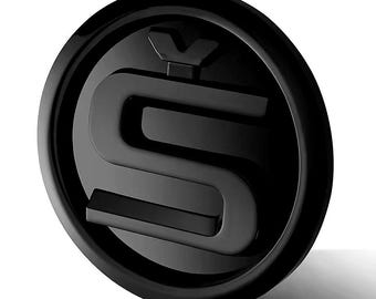 May include: Black glossy car emblem with a stylized letter 'S' and a small 'V' above it.