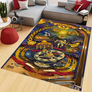 May include: A colourful space-themed pinball machine rug with a blue, yellow and red colour scheme. The rug features a space station, an astronaut and a spaceship. The text "SPECIAL WHEN FLASHING" is visible on the rug.