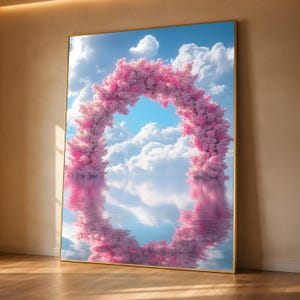 May include: A rectangular wall art print in a thin gold frame featuring a vibrant pink floral archway standing amidst fluffy white clouds and a bright blue sky, with the entire scene reflected clearly in a calm, smooth body of water below.