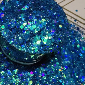 color shift sea blue glitter in reusable jars and per ounce
