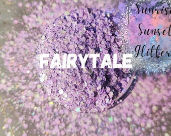 May include: Purple and iridescent glitter with the text "FAIRYTALE" and "Sunrise Sunset Glitter" in the background.