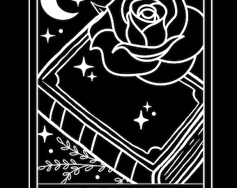 May include: A black and white illustration of a tarot card with a rose and a book. The card is titled "The Reader".