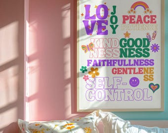 May include: A white poster with colourful text that reads "Love, Joy, Peace, Patience, Kindness, Goodness, Faithfulness, Gentleness, Self-Control". The text is in a retro font style with flowers and other decorative elements.
