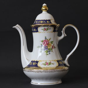 Vintage gilded coffeepot with floral patterns and golden accent Winterling Porcelain