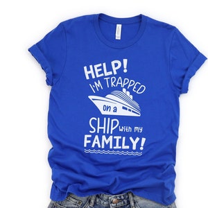 May include: A royal blue t-shirt with white text that reads "Help! I'm trapped on a ship with my family!" and a white silhouette of a cruise ship.
