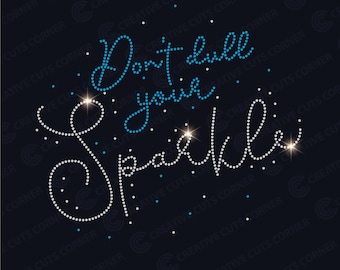 May include: A rhinestone design with the text "Don't dull your sparkle" in blue and white rhinestones on a black background.