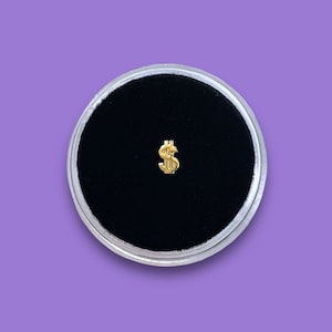 Gold Dollar Sign Tooth Gem