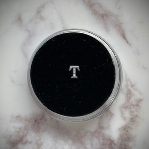 Gema de dente “T” prateada