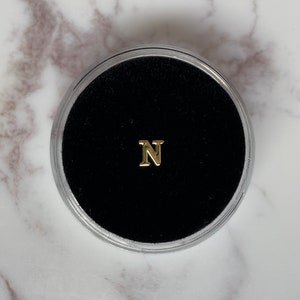 Gold “N” Tooth Gem