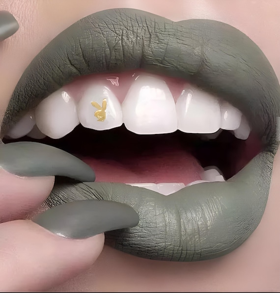Gold Playboy Bunny Tooth Gem