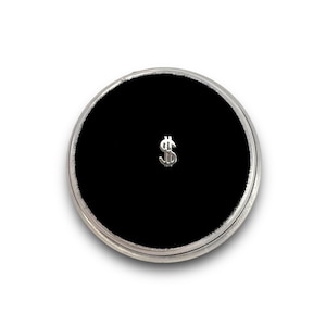 Klejnot w kształcie zęba ze srebrnym znakiem dolara