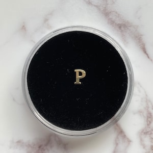 Gold “P” Tooth Gem