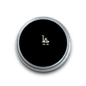 Charm pierre denté LA en or massif 18 carats