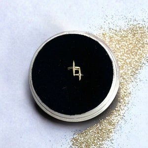Gema de dente com brilho duplo dourado