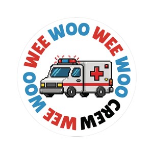 May include: A round sticker featuring a pixelated ambulance with a red cross and flashing lights. The words "WEE WOO" in red and blue surround the ambulance, with "CREW" in black at the bottom.