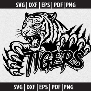 Puede incluir: Gráfico en blanco y negro de un tigre rugiendo con la palabra "TIGERS" incorporada. El tigre se representa con garras extendidas. Opciones de archivo: SVG, DXF, EPS, PDF y PNG.