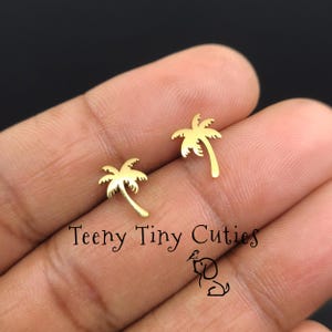 Mini Tropical Palm / Coconut Tree Non Tarnish Stainless Steel Earrings. Push Back Style Comes in Gold, Rose Gold, Silver & Black Tones.