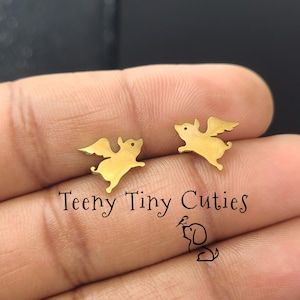 Funny Flying Piglets No Fade Stainless Steel Push Back Stud Earrings. Laser Cut Comes In Gold, Rose Gold, Silver & Black Tones. Pig Earrings