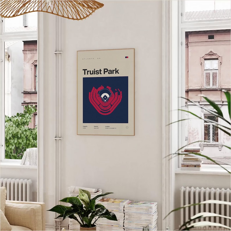 May include: A minimalist poster with a navy blue background and a red outline of Truist Park, a baseball stadium in Atlanta, Georgia. The poster has the text "Truist Park" in white and "Atlanta, GA" in gray.