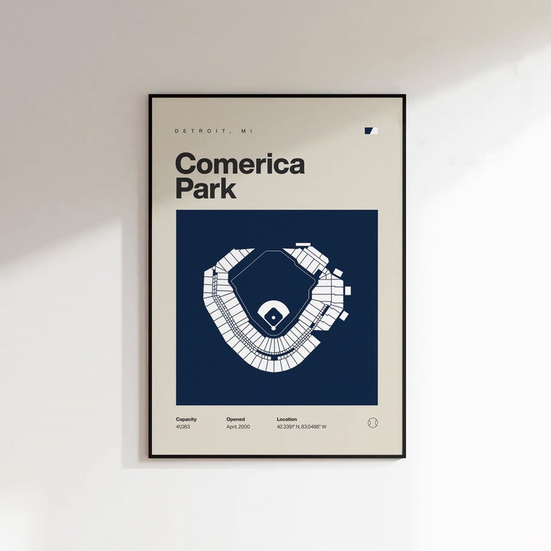 May include: A minimalist poster with a white outline of Comerica Park, a baseball stadium in Detroit, Michigan. The stadium is outlined in white on a dark blue background. The poster includes the text "Comerica Park" in white, along with the stadium's capacity, opening date, and location.