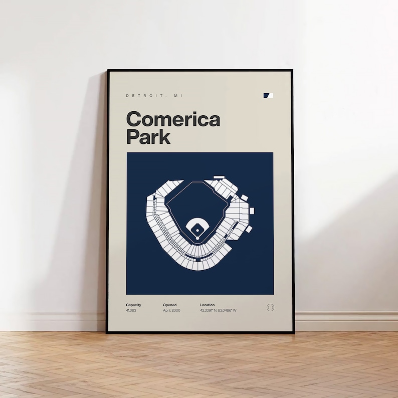 May include: A white outline of Comerica Park, a baseball stadium in Detroit, Michigan, on a dark blue background. The stadium's capacity is 41,083, it opened in April 2000, and its location is 42.3397&deg; N 83.0489&deg; W.