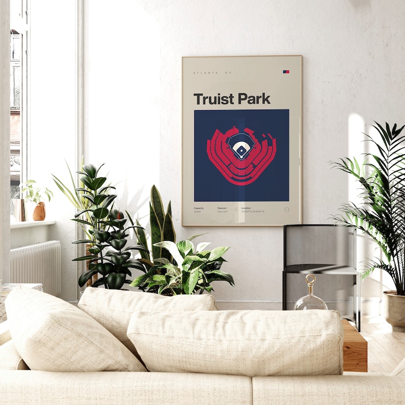 May include: A minimalist poster with a navy blue background and a red outline of Truist Park, a baseball stadium in Atlanta, Georgia. The poster has the text "Truist Park" and "Atlanta, GA" in white.