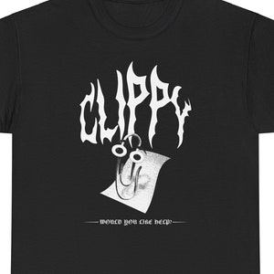 May include: Black t-shirt with a white graphic of a paperclip with the word "CLIPPY" in a stylized font above it. The text "WOULD YOU LIKE HELP?" is below the graphic.