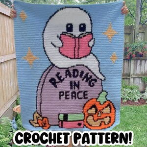 May include: A light blue crochet blanket with a white ghost reading a pink book. The ghost is on a purple tombstone with the words "READING IN PEACE". An orange jack-o'-lantern and books are also featured. The words "CROCHET PATTERN!" are at the bottom.