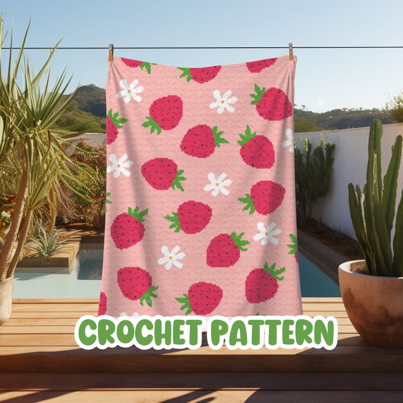 May include: A crochet pattern featuring a pink background with a repeating pattern of strawberries and white flowers. The text "CROCHET PATTERN" is displayed at the bottom of the image.