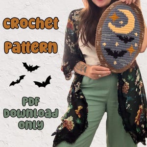 May include: A crocheted oval-shaped pattern with a crescent moon, stars, and bats. The text "CROCHET Pattern" and "PDF Download Only" are visible. The image shows a person holding the crocheted item.
