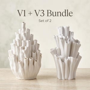 Two matte white textured coral vases side by side under a "V1 + V3 Bundle, Set of 2" label, one with thin tubes and one with wider ruffled segments. Sculptural vase pair, about 7.2 in tall.