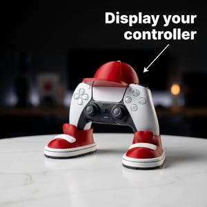 Gaming controller displayed on a red and white shoe stand with text 'Display your controller'.