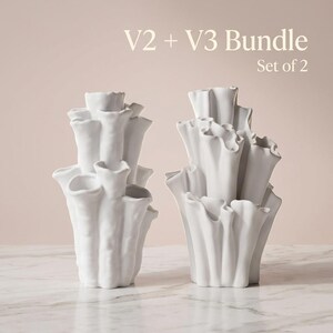 Two matte white textured coral vases side by side under a "V2 + V3 Bundle, Set of 2" label. Sculptural vase pair, each about 7.2 in tall, a gift for plant lover.