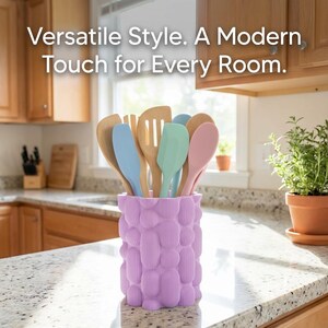 Textured matte lavender unique vase holding wooden and silicone utensils on a kitchen counter, with the text "Versatile Style. A Modern Touch for Every Room."