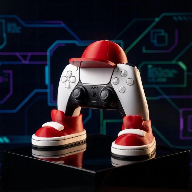 Gaming controller with red and white shoes on a reflective surface against a futuristic background