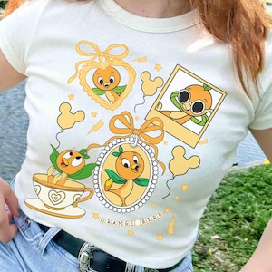 Camiseta Coquette Bows Disney Orange Bird, Camiseta Walt Disney Epcot World Tour Orange Bird, Camiseta Hello Sunshine Orange Bird, Camiseta para viaje a Disneyland