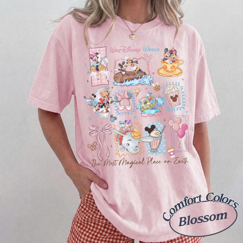 May include: Pink Comfort Colors Blossom t-shirt featuring Disney characters in a collage of images. The shirt includes the text "Walt Disney World" and "The Most Magical Place on Earth."
